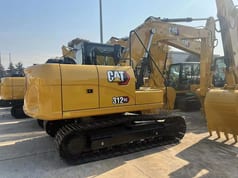 2026 Caterpillar 312GC crawler excavator, rear three-quarter view