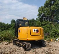 2019 Caterpillar 307E crawler excavator, rear three-quarter view