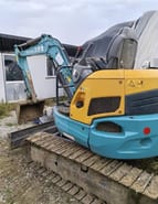 Kubota 3.5U mini excavator, rear three-quarter view