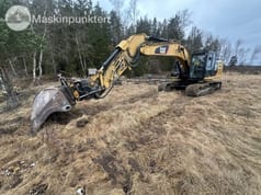 2015 Caterpillar 323EL crawler excavator side view
