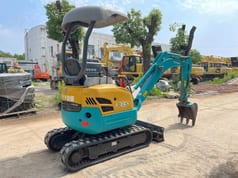 2024 Kubota U15S mini excavator, rear three-quarter view