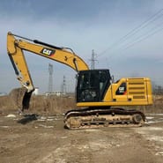 2021 Caterpillar 320GC crawler excavator, side profile view