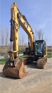 2014 Caterpillar 318E crawler excavator, front three-quarter view 2014 Caterpillar 318E crawler excavator, front three-quarter view