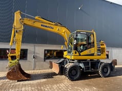 2019 Komatsu PW148-11 wheel excavator side view 2019 Komatsu PW148-11 wheel excavator side view