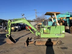 Mitsubishi ME30 mini excavator, side view