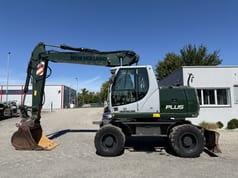 2009 New Holland MH-PLUS wheel excavator side view