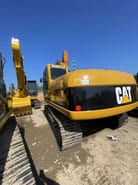 2020 Caterpillar 320CL crawler excavator, rear three-quarter view