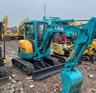 Kubota KX135 mini excavator, side view