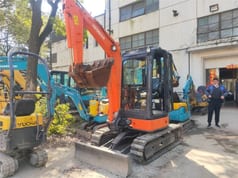 2023 Hitachi ZX30 mini excavator, front three-quarter view 2023 Hitachi ZX30 mini excavator, front three-quarter view