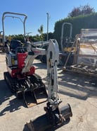 2023 Takeuchi TB210R mini excavator, front three-quarter view