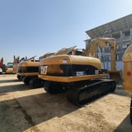 2023 Caterpillar 320CL crawler excavator, rear three-quarter view 2023 Caterpillar 320CL crawler excavator, rear three-quarter view