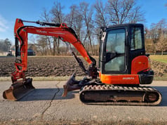 2015 Kubota KX057-4 mini excavator side view 2015 Kubota KX057-4 mini excavator side view