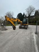 2018 Liebherr A910 COMPACT LITRONIC wheel excavator, front three-quarter view