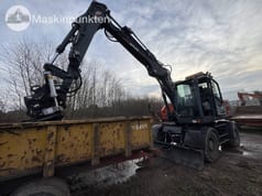 2014 Atlas 160W wheel excavator side view