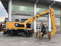2018 Caterpillar MH3024 material handler, side profile view 2018 Caterpillar MH3024 material handler, side profile view