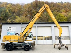 2011 Liebherr A934C material handler side view