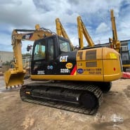 2008 Caterpillar 320D2 crawler excavator, side view 2008 Caterpillar 320D2 crawler excavator, side view