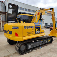 2014 Komatsu PC130 crawler excavator, rear three-quarter view 2014 Komatsu PC130 crawler excavator, rear three-quarter view