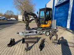 Berger Kraus BK2000NKSR mini excavator on trailer with attachments