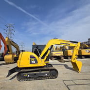 Komatsu PC70-8 mini excavator, side profile view