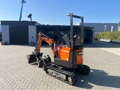 2022 Doosan DX10Z mini excavator, rear three-quarter view 2022 Doosan DX10Z mini excavator, rear three-quarter view