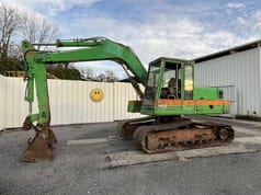 1985 Poclain 90 crawler excavator, side view