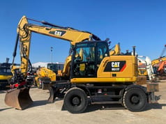 2018 Caterpillar M317F wheel excavator, side profile view
