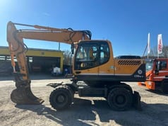 2012 Hyundai R170W-9 wheel excavator, side view 2012 Hyundai R170W-9 wheel excavator, side view