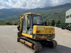 2006 Komatsu PC 75R mini excavator, rear three-quarter view