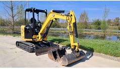 2023 Caterpillar 302.7 crawler excavator, front three-quarter view