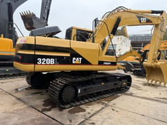2024 Caterpillar 320BL crawler excavator, rear three-quarter view