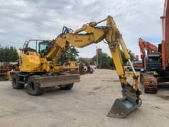 2018 Komatsu PW118MR-11W wheel excavator, side view