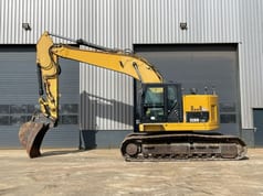2012 Caterpillar 328D LCR crawler excavator, side view