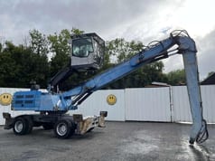 2011 Fuchs MHL335 material handler, side view