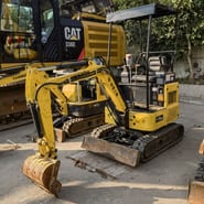 2022 Komatsu PC15MR mini excavator, front three-quarter view 2022 Komatsu PC15MR mini excavator, front three-quarter view