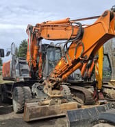 2008 Hitachi ZX170W-3 wheel excavator, front three-quarter view 2008 Hitachi ZX170W-3 wheel excavator, front three-quarter view