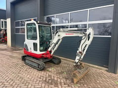 2011 Takeuchi TB219 mini excavator, side view