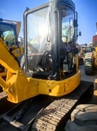 Komatsu PC55MR-5 Mini Excavator, side view of cab and tracks