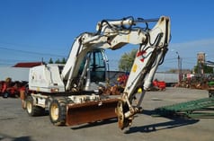 2008 CASE WX145 wheel excavator, front three-quarter view 2008 CASE WX145 wheel excavator, front three-quarter view