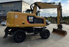 2016 Caterpillar M318F wheel excavator side view