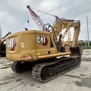 2018 Caterpillar 320 crawler excavator, rear three-quarter view