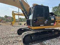 2022 Caterpillar 320DL rupsgraafmachine zijaanzicht 2022 Caterpillar 320DL rupsgraafmachine zijaanzicht