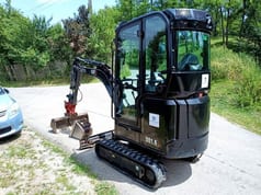2019 Caterpillar 301.6-05A mini excavator, rear three-quarter view