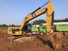 2022 Caterpillar 330 crawler excavator side view