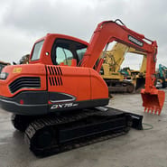 2020 Doosan DX75-9C crawler excavator, rear three-quarter view 2020 Doosan DX75-9C crawler excavator, rear three-quarter view