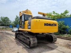 2018 Komatsu PC300-7 crawler excavator, rear three-quarter view 2018 Komatsu PC300-7 crawler excavator, rear three-quarter view