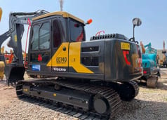 2023 Volvo EC140 crawler excavator, rear three-quarter view 2023 Volvo EC140 crawler excavator, rear three-quarter view