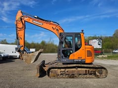 2021 Doosan DX140LCR-5 crawler excavator, side view 2021 Doosan DX140LCR-5 crawler excavator, side view