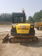 2023 Hyundai 60-7 mini excavator, rear view