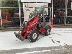 2010 Weidemann 1250 CX 35 mini excavator, front three-quarter view